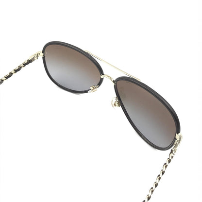 Chanel Gold And Black Polarized Aviator Women's Sunglasses (Pre-Owned)