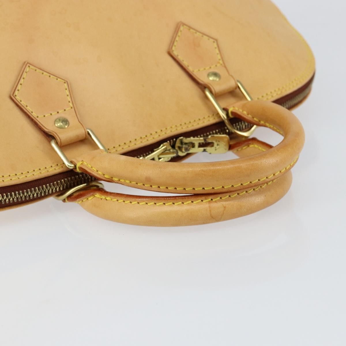 Louis Vuitton Alma Handbag Nomade Leather Beige Leather Handbag (Pre-Owned)