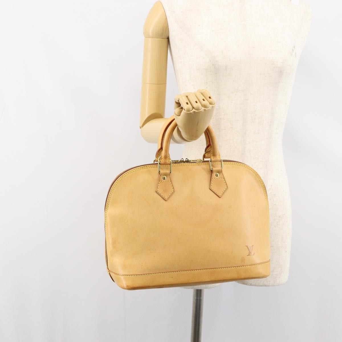 Louis Vuitton Alma Handbag Nomade Leather Beige Leather Handbag (Pre-Owned)